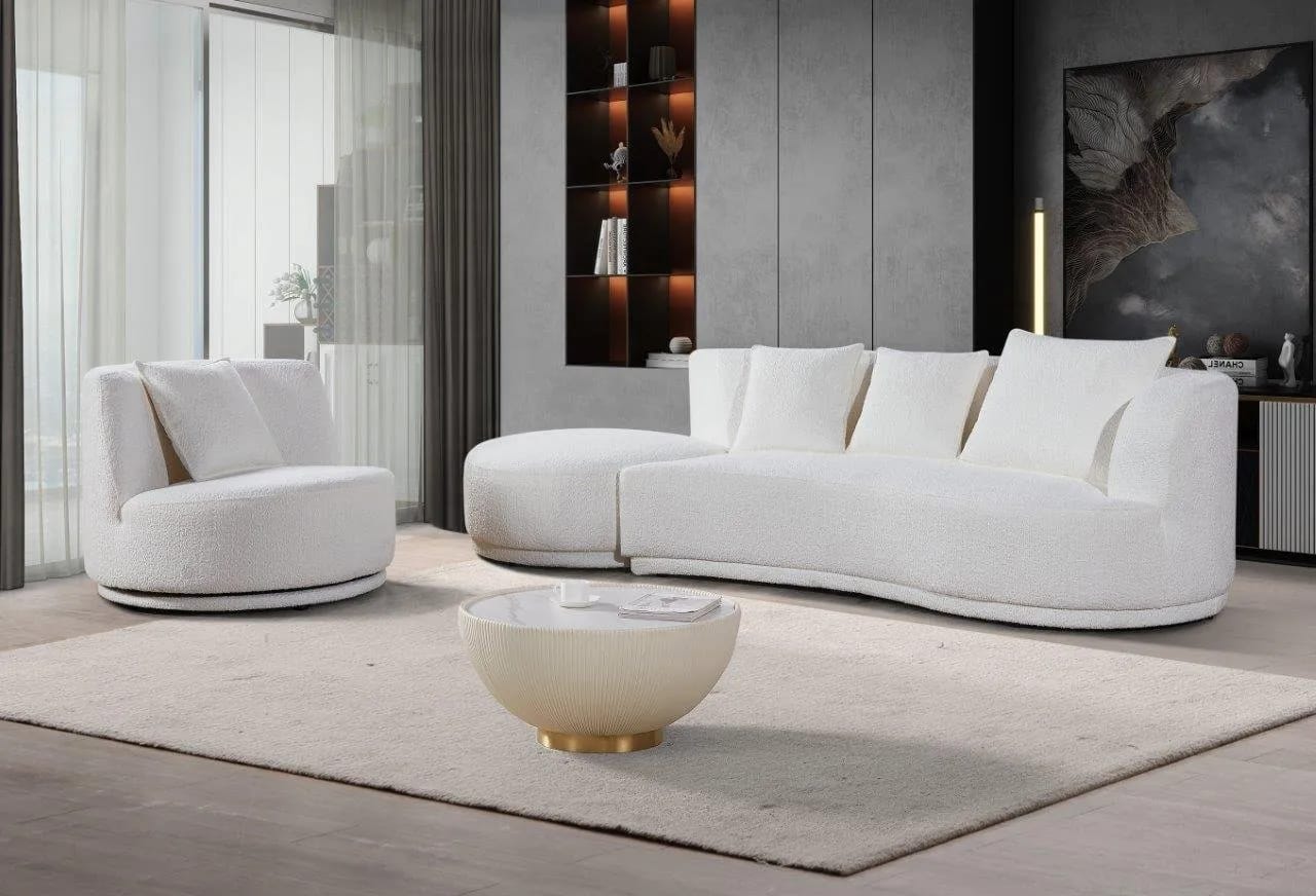 Salon contemporain — canapé bouclé, table basse cannelée et mobilier de séjour